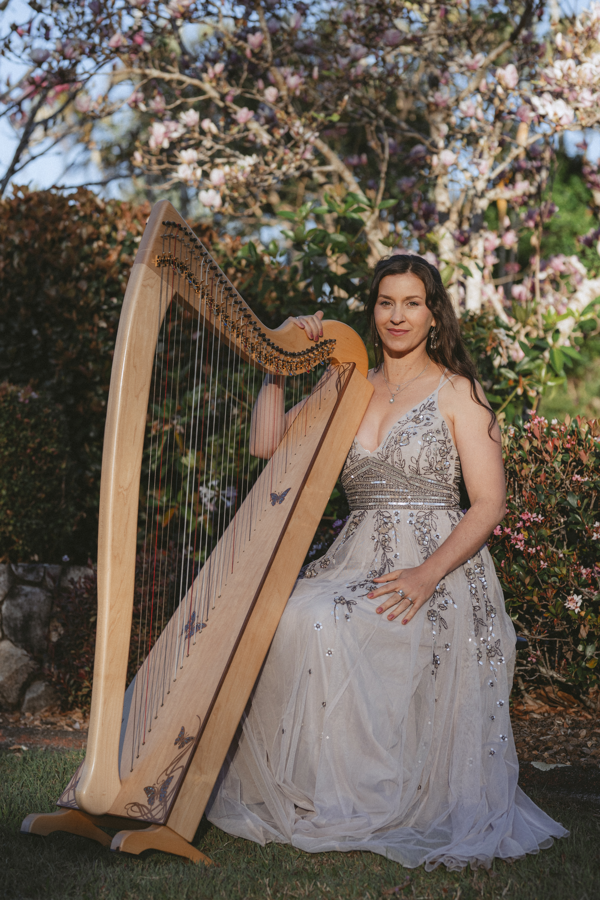 Claire Evelynn, harp player in Sunshine Coast