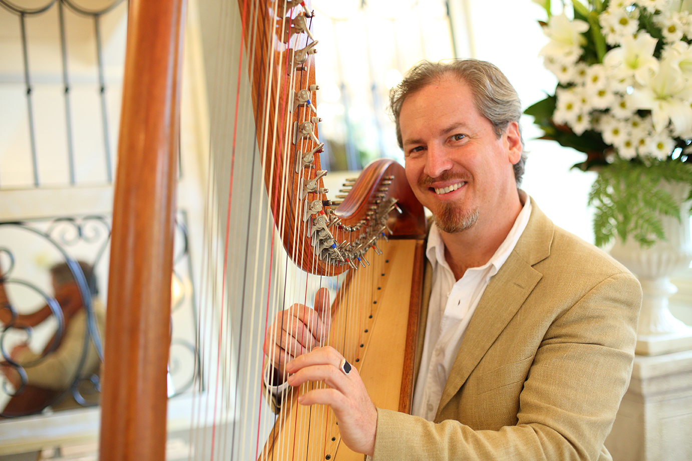 Kim Kirkman, harp player in Sunshine Coast