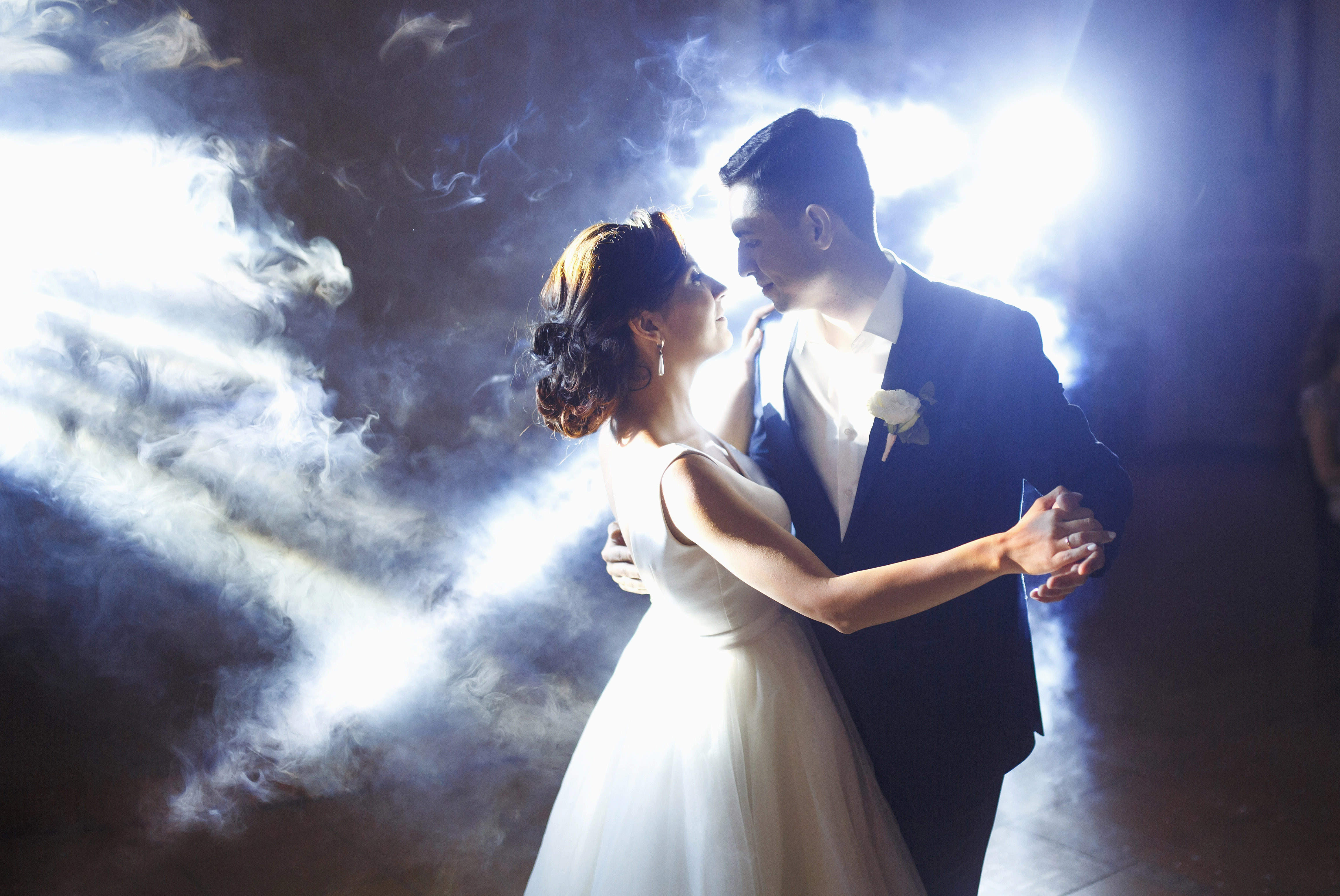 Newlyweds dancing together at their wedding reception